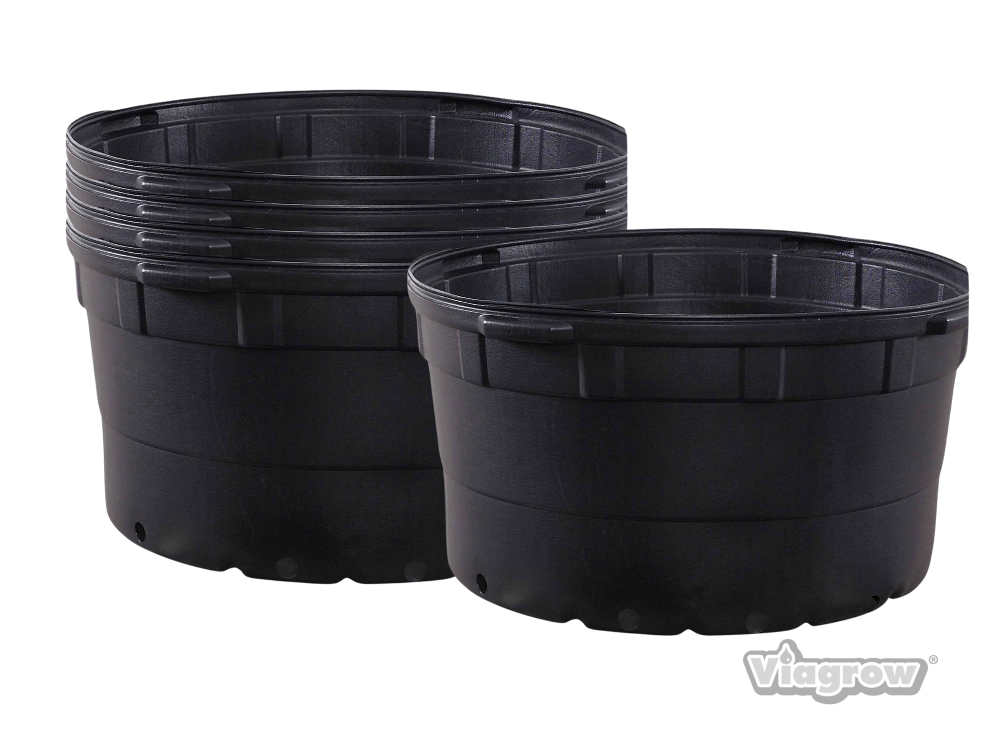 A stack of black 35-gallon nursery pots with visible drainage holes, designed for large-scale gardening.