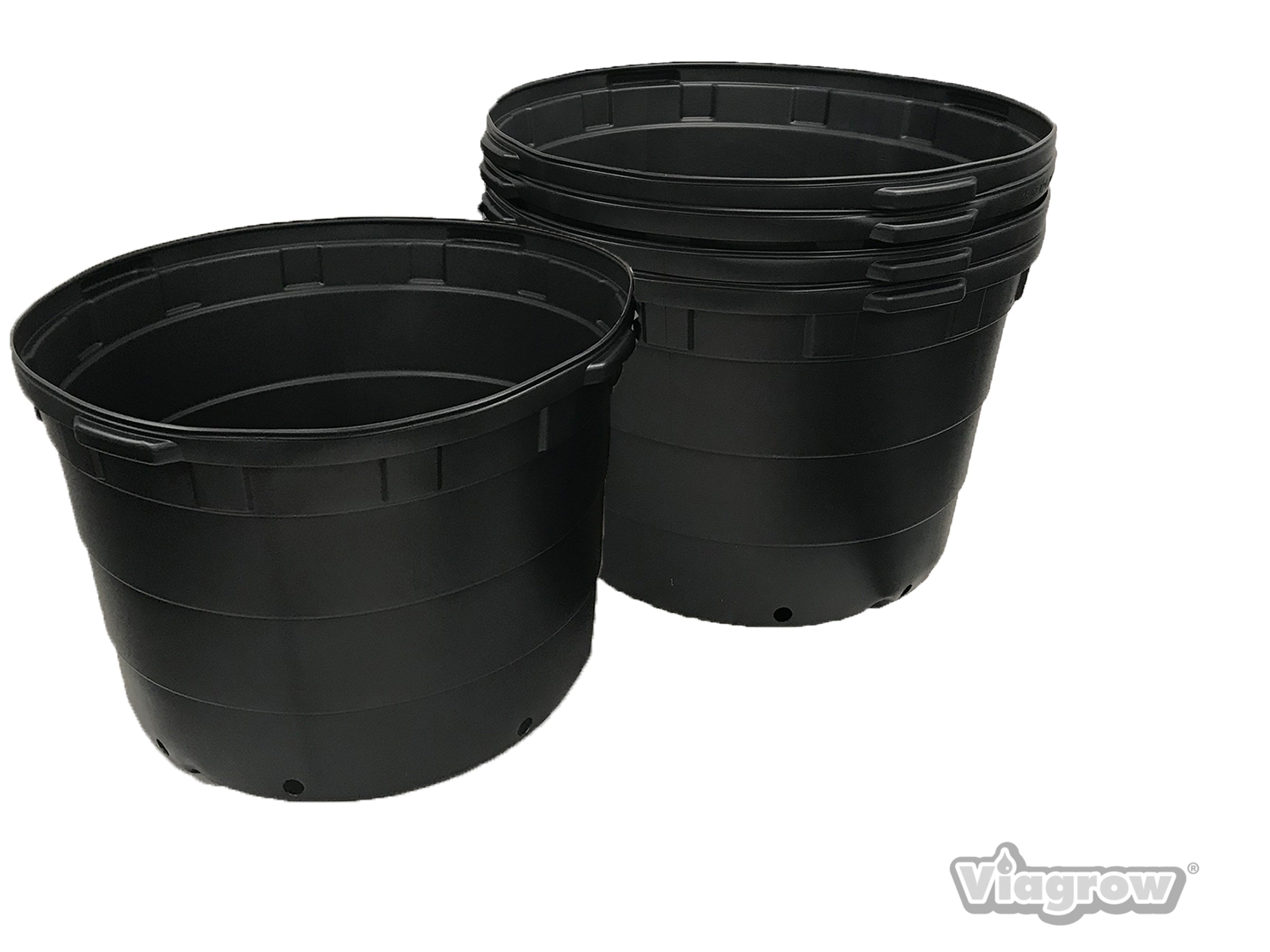 Two black, round, plastic plant pots designed for large-scale growing, with a raised rim and stackable design.