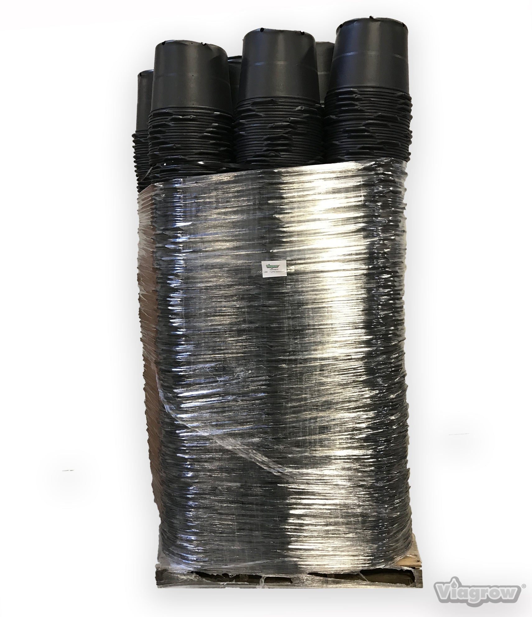 A bundle of black plastic nursery pots tied with wire, presumably part of a larger pallet order.